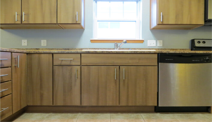 Contemporary kitchen remodel done with cabinet refacing