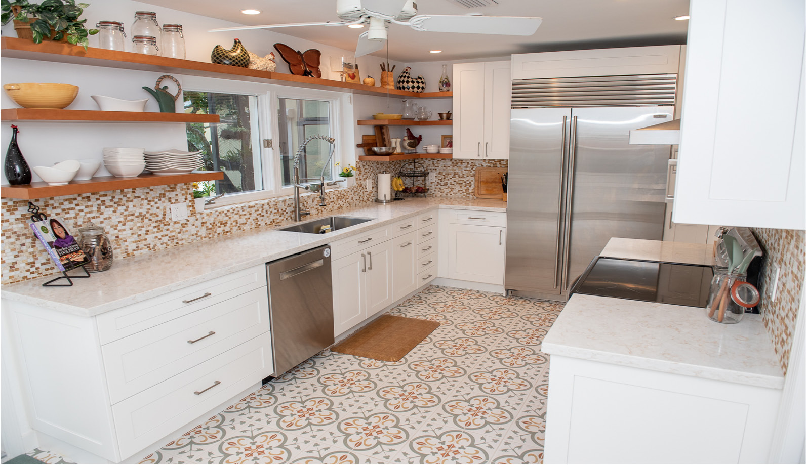Paisley tiled kitchen with white cabinetry and open shelving