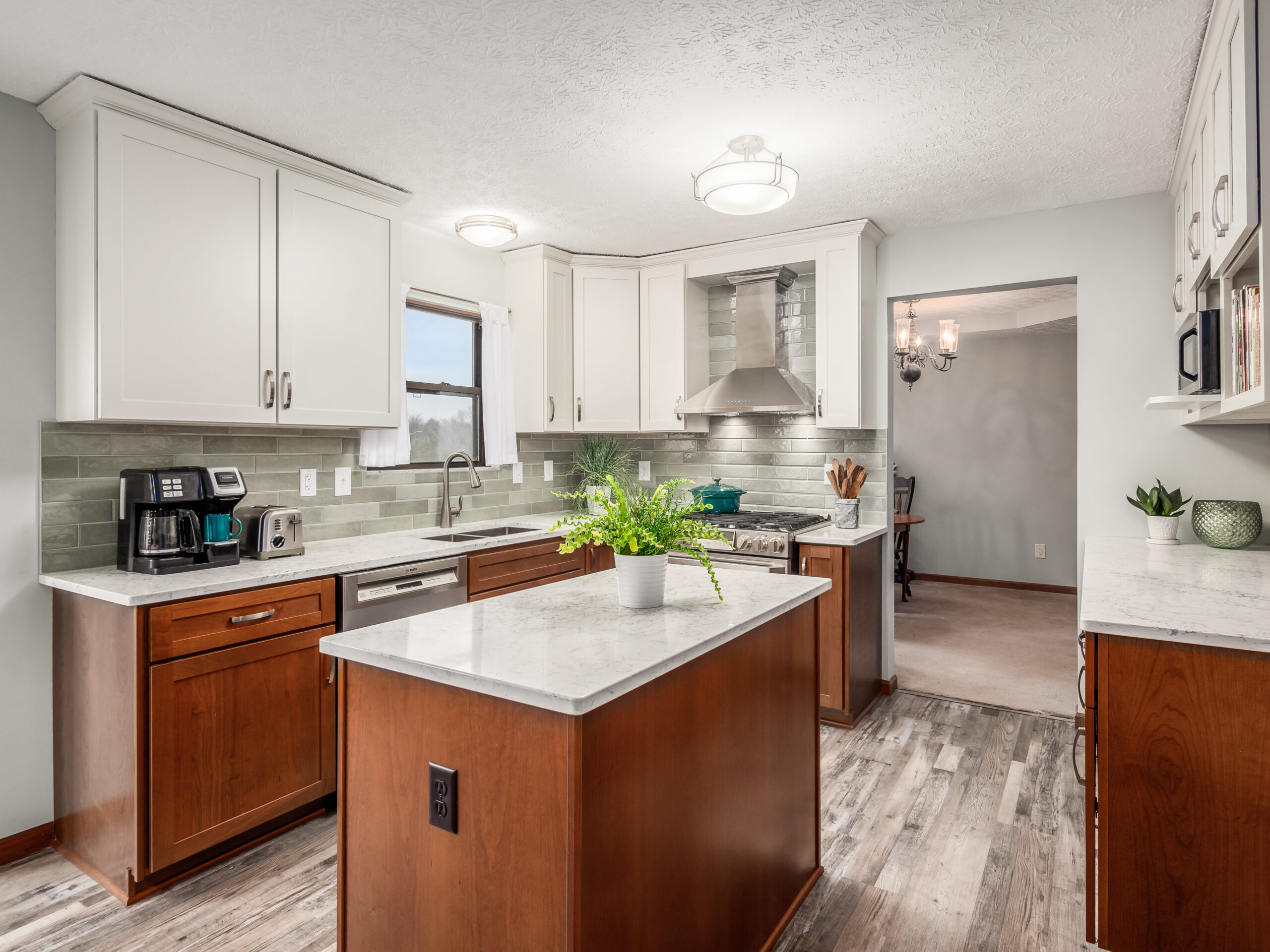 White kitchen with two-toned cabinetry